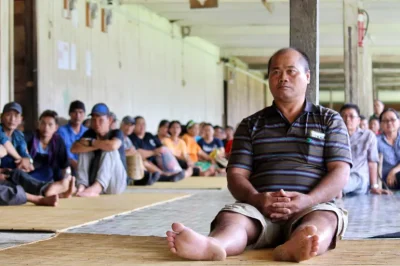 villagers gather for a meeting in Long Tungan